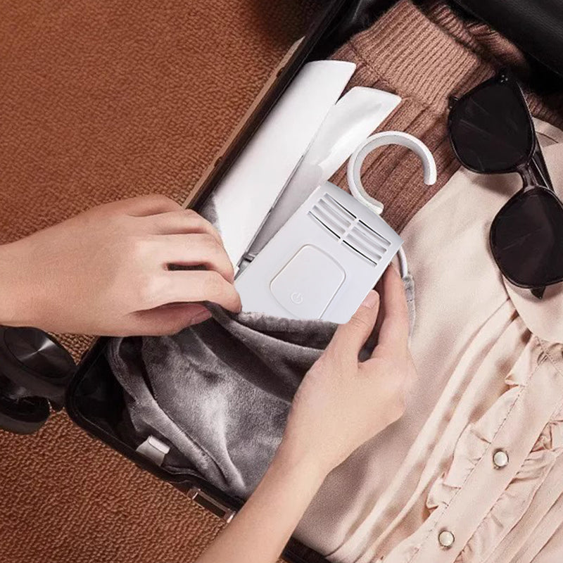 Cintre électrique pliable et portable pour le séchage des vêtements